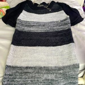 This is a sweater dress for ages around 10-12 year olds